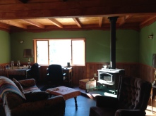 Living room with wood stove for ultimate confort.